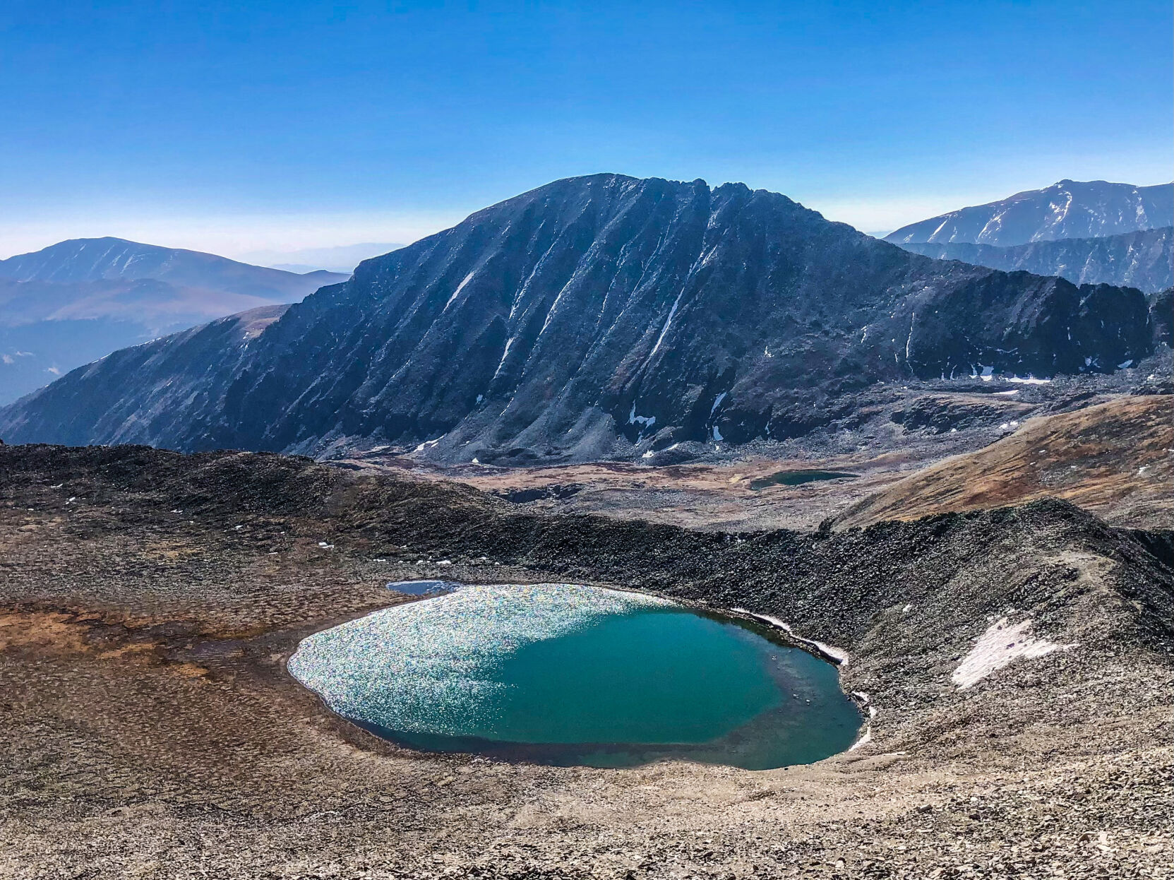 Looking down at America's highest alpine lake from a nearby peak. Photo Credit: Spencer McKee